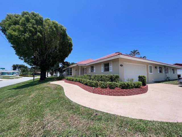 Front exterior of Serenity Living Home Care on Buttercup Circle, Palm Beach Gardens