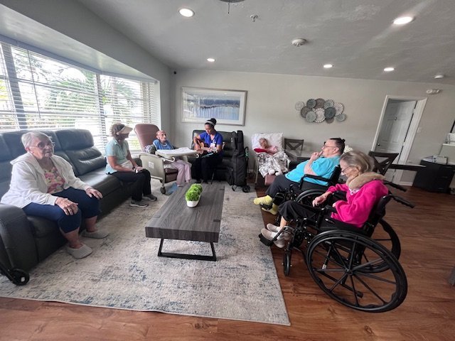Residents spending time together at Serenity Living Home Care on Buttercup Circle in Palm Beach Gardens