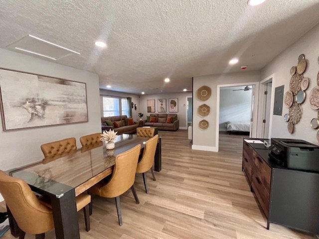 Dining table and open kitchen at Serenity Living Home Care II on Holly Drive