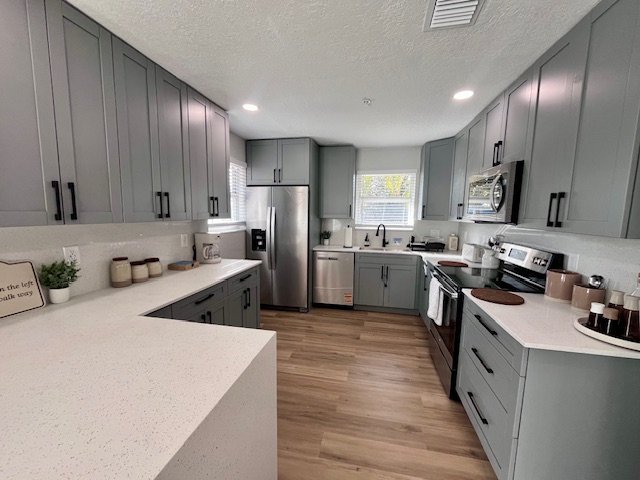 Bright kitchen where home-cooked meals are prepared at Serenity Living Home Care II
