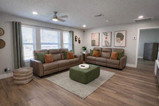 Bright living room at Serenity Living Home Care II, an assisted living home in Palm Beach Gardens